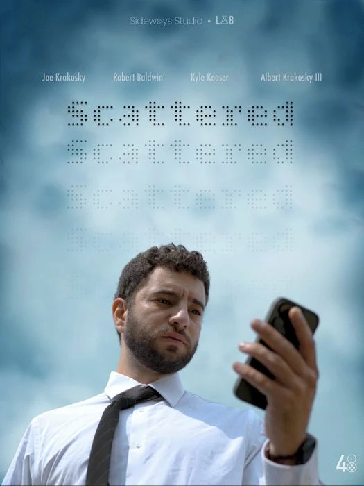 The complete Scattered poster, with dotted title and credits above a man holding a phone
